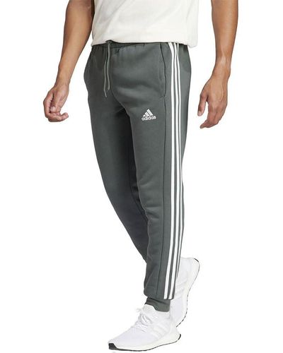 adidas Essentials Fleece 3-Stripes Tapered Cuff Pants Pantalones - Gris