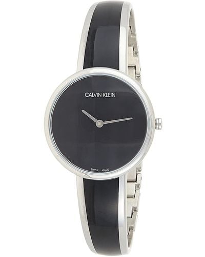 Calvin Klein Erwachsene Analog Quarz Uhr mit Edelstahl Armband K4E2N111 - Schwarz