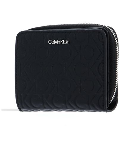 Calvin Klein CK Must Zip Around Wallet with Flap Embossed M CK Black - Schwarz