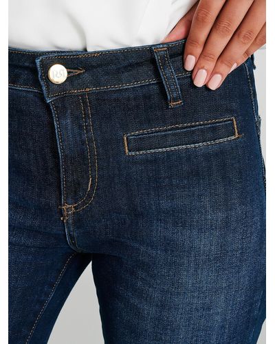 Rinascimento Jeans a Zampa Lavaggio Scuro - Blu