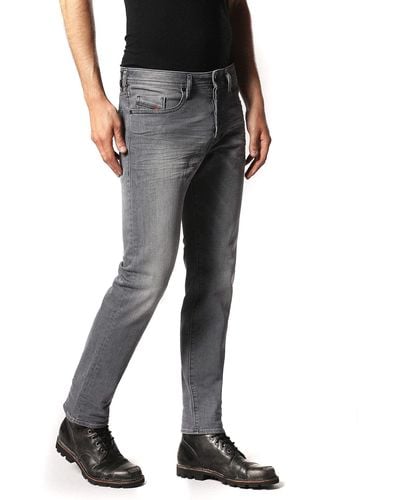 DIESEL Buster 084HP Jeans Hose Regular Slim Tapered - Schwarz