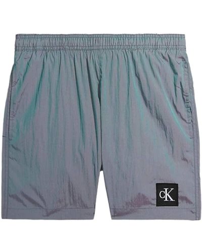 Calvin Klein Beachwear Uomo Grigio Shorts Mare Grigio da Uomo con Patch Logo S - Blu