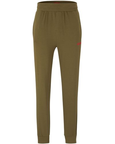 HUGO Labelled Pants Jogginghose aus elastischem Baumwoll-Jersey mit rotem Logo Hellgrün M