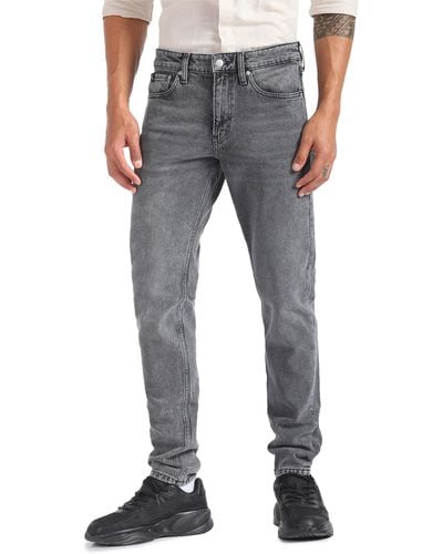 Calvin Klein Jeans Slim Taper Tapered Fit - Grau