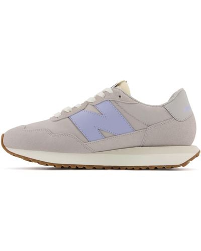 New Balance 237 in nero/rossa