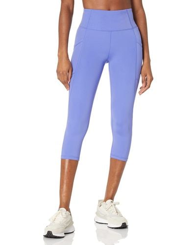 Amazon Essentials Active Formende Capri-Leggings mit hohem Bund und Taschen - Blau