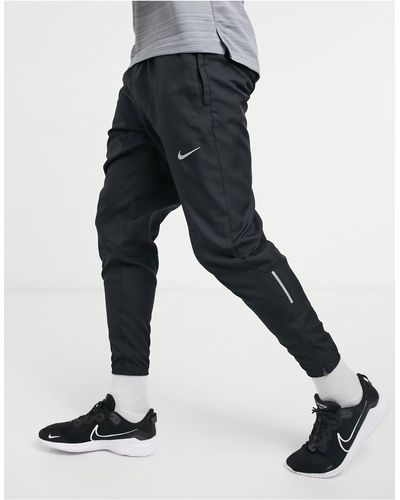 Nike Nike – running – gewebte jogginghose - Schwarz