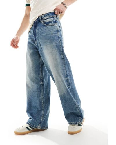 Bershka Jeans super larghi medio slavato - Blu