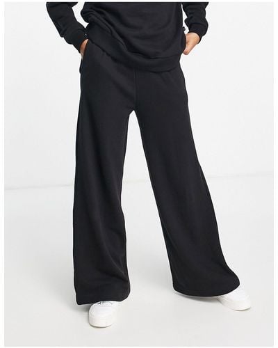 Chelsea Peers High Waist Wide Leg sweatpants With Woven Logo Tab - Black