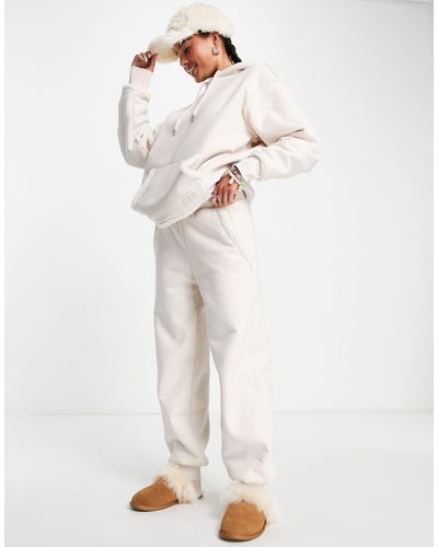 UGG – daylin – jogginghose aus mehrlagig verbundenem fleece - Weiß