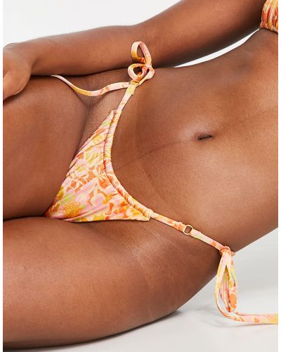 Rhythm Evangeline - slip bikini raccolti con laccetti laterali e stampa rétro a fiori - Marrone