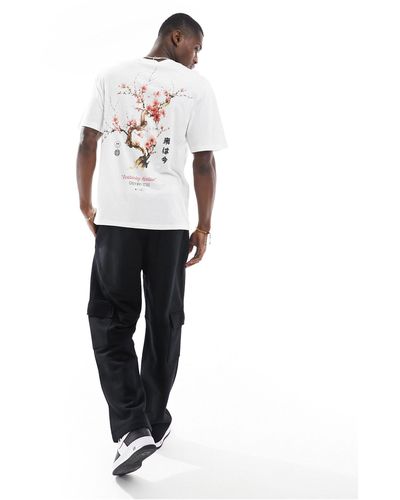 Jack & Jones T-shirt oversize bianca con stampa sul retro di ciliegio - Bianco