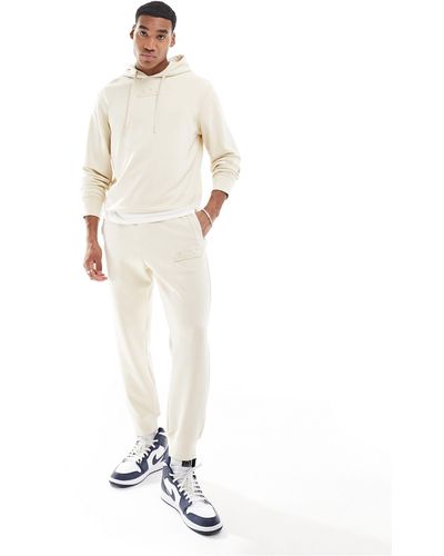 Armani Exchange – jogginghose aus sweatshirt-stoff - Weiß