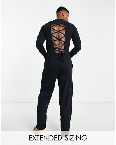 ASOS Pyjama avec haut à manches longues avec col montant noué dans le dos et pantalon - Noir