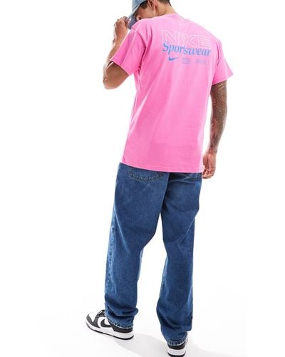 Nike Camiseta con estampado gráfico en la espalda - Rosa