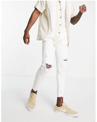 Pull&Bear Jeans skinny bianchi con strappi - Bianco
