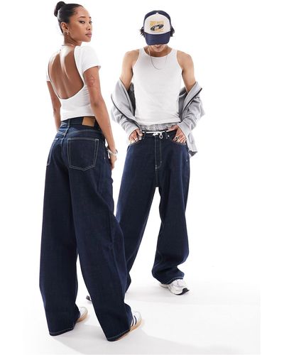 Weekday Astro - jeans unisex ampi risciacquato a fondo ampio - Blu