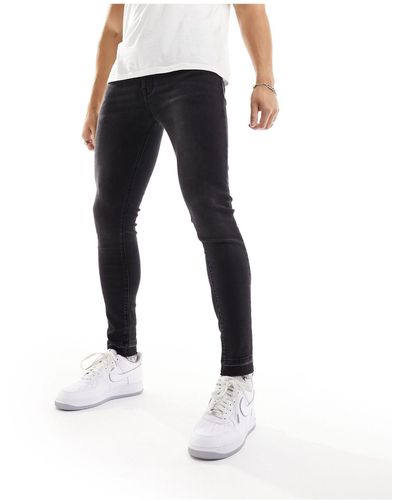 ASOS Spray On Jeans With Power Stretch And Released Hem - Black