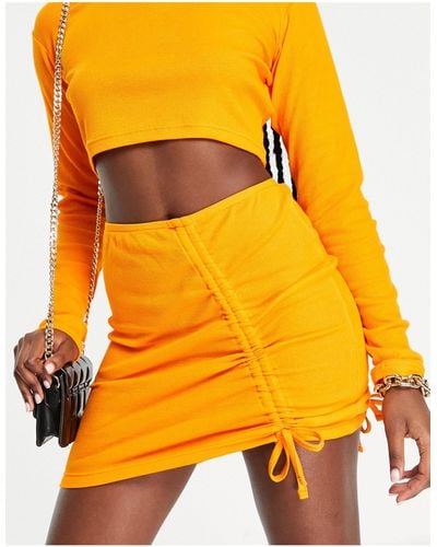 The Couture Club Ribbed Plait Detail Mini Skirt Co-ord - Orange
