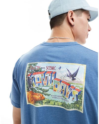 Kavu Camiseta azul con estampado gráfico en la espalda