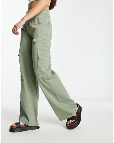 ASOS DESIGN clean cargo pants in green with contrast stitching