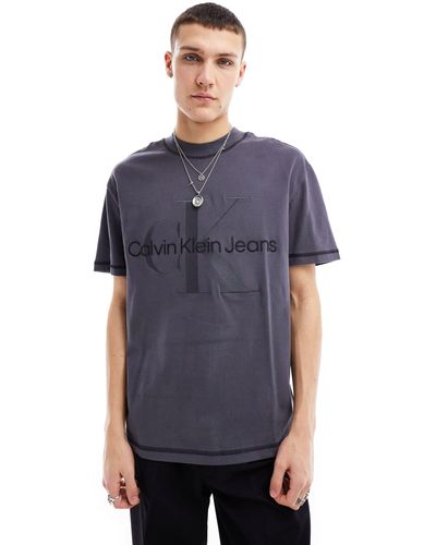 Calvin Klein T-shirt slavato con cappuccio e monogramma del logo - Blu
