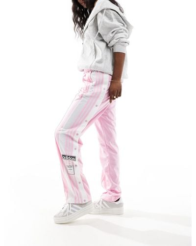 adidas Originals Adibreak - pantaloni pastello con bottoni a pressione - Rosa