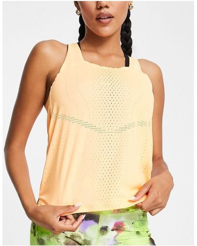 Nike Camiseta color melocotón sin mangas dri-fit adv race day - Naranja