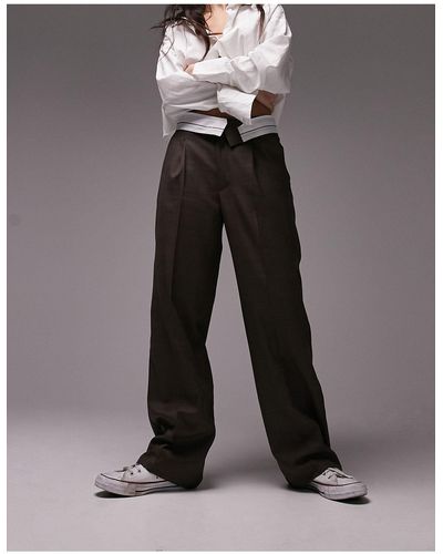TOPSHOP Pantalon ajusté coupe masculine à taille basse avec taille repliée - Noir