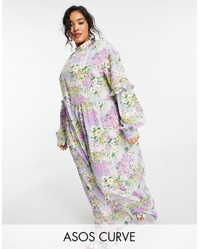ASOS Asos design curve - tuta jumpsuit a punto smock con stampa a fiori - Multicolore