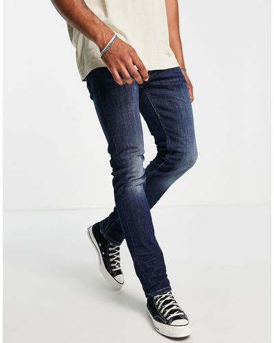 AllSaints – rex – jeans mit schmalem schnitt - Blau