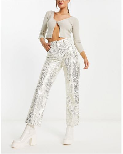 Amy Lynn Pantalones metalizado con diseño texturizado lupe - Blanco