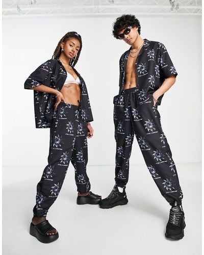 Collusion Unisex Co-ord Noughties Fit joggers With All Over Print - Black