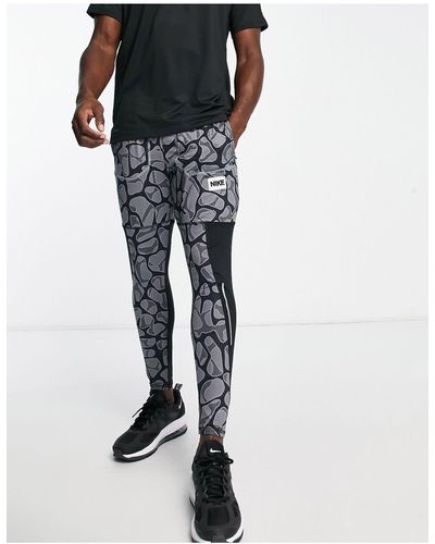 Nike Dye stride dri-fit - joggers grigi con stampa - Nero