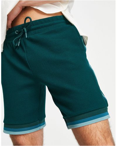 River Island – strukturierte shorts - Grün