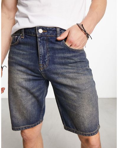 ASOS Pantaloncini di jeans slim lunghezza media lavaggio y2k - Blu