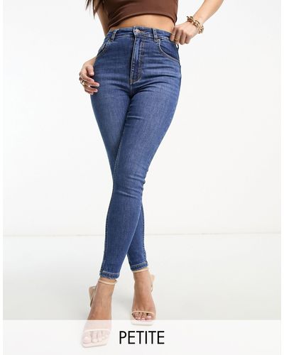 Bershka Petite - jeans skinny a vita alta alla caviglia medio - Blu