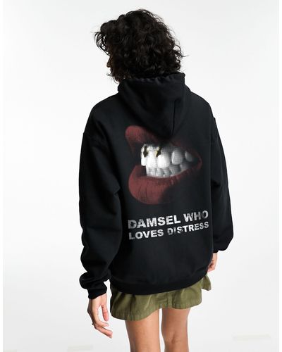 ASOS Oversized Hoodie With Damsel Who Loves Distress Graphic - Black