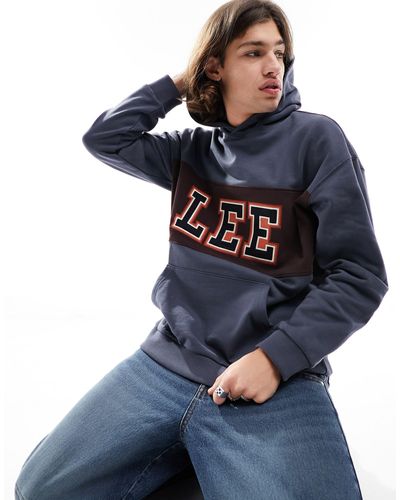 Lee Jeans Sweat à capuche oversize avec empiècement logo style universitaire sur la poitrine - cendré - Bleu