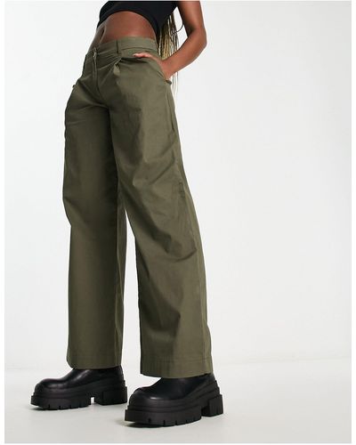 Monki Pantaloni con fondo ampio color kaki - Verde