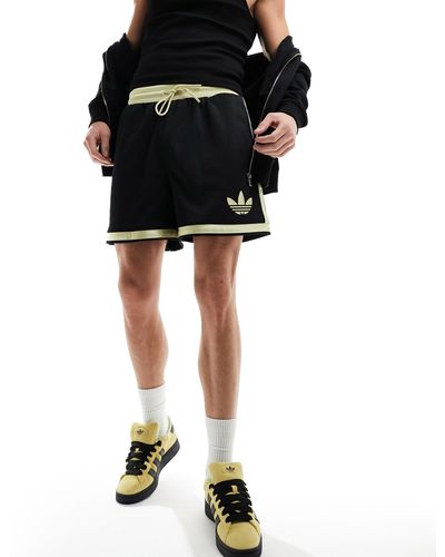 adidas Originals Adidas originals - pantaloncini stile basket neri - Nero
