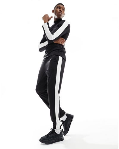 ASOS 4505 Contrast Side Stripe Slim Fit jogger - White