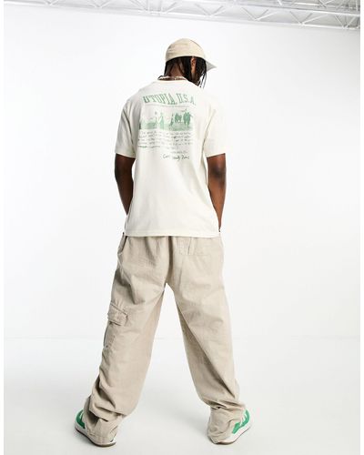 Coney Island Picnic T-shirt à manches courtes avec imprimé utopia sur la poitrine et au dos - cassé - Neutre
