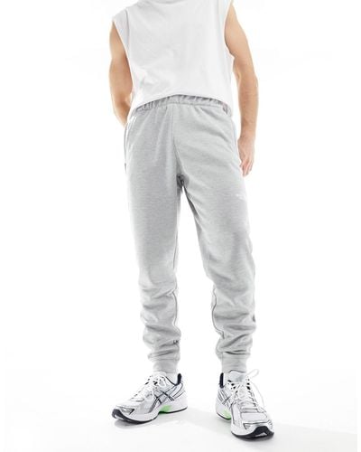 The North Face Training Reaxion Fleece joggers - Grey