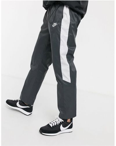 Nike – club – gewebte jogginghose mit geradem bein - Grau