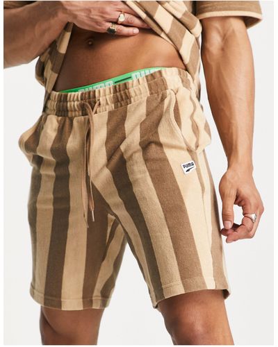 PUMA Plus – shorts aus frottee - Braun