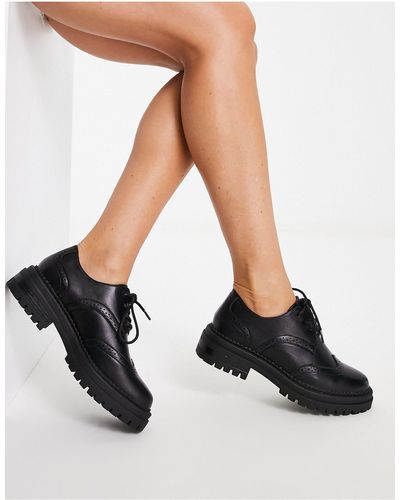 schuh black lace up boots