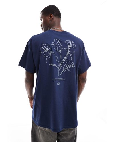 ASOS Camiseta azul extragrande con estampado floral en la espalda