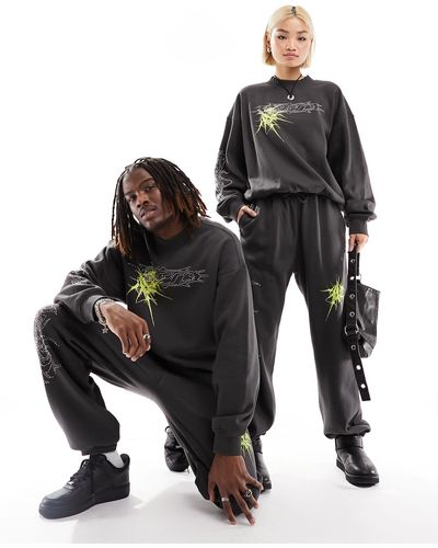 Weekday Unisex Co-ord sweatpants With Rhinestones And Graphic Print - Black