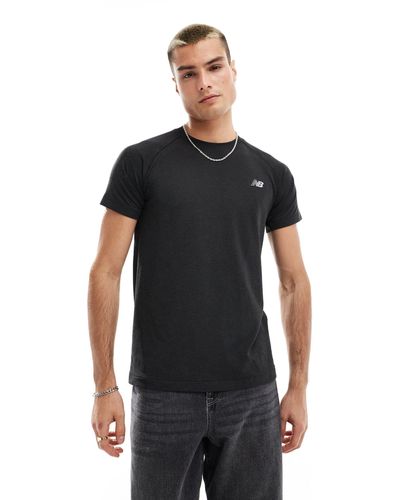 New Balance – t-shirt aus strick - Schwarz